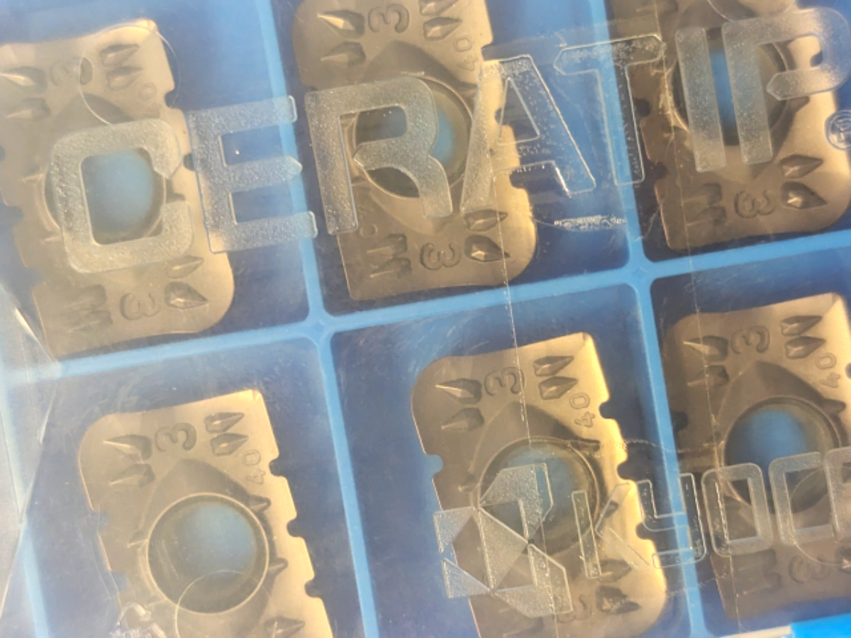 Kyocera WSP APMT250640ER-NB3, Sorte PR1230